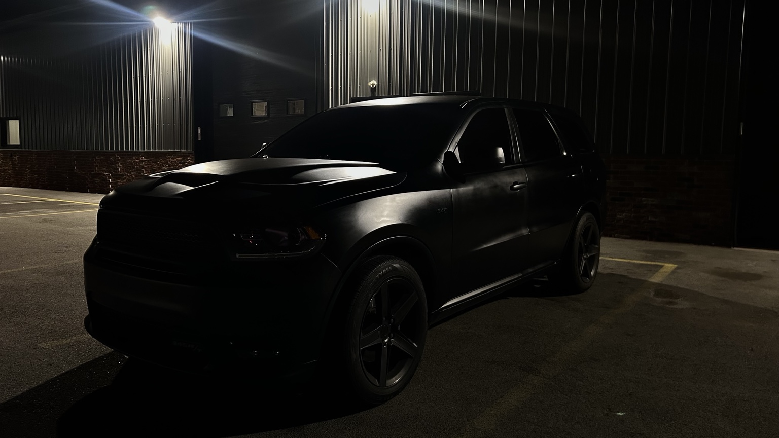 Front three-quarter portrait of a black Durango
